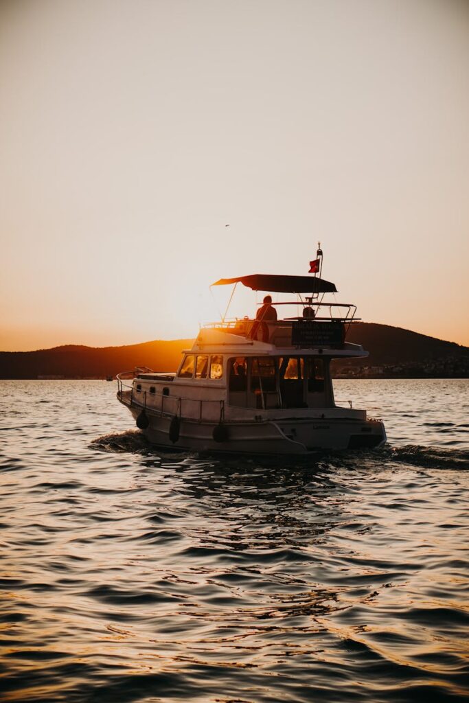 a boat at sunset